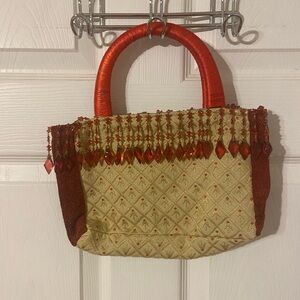 Elegant Red and Gold Handbag